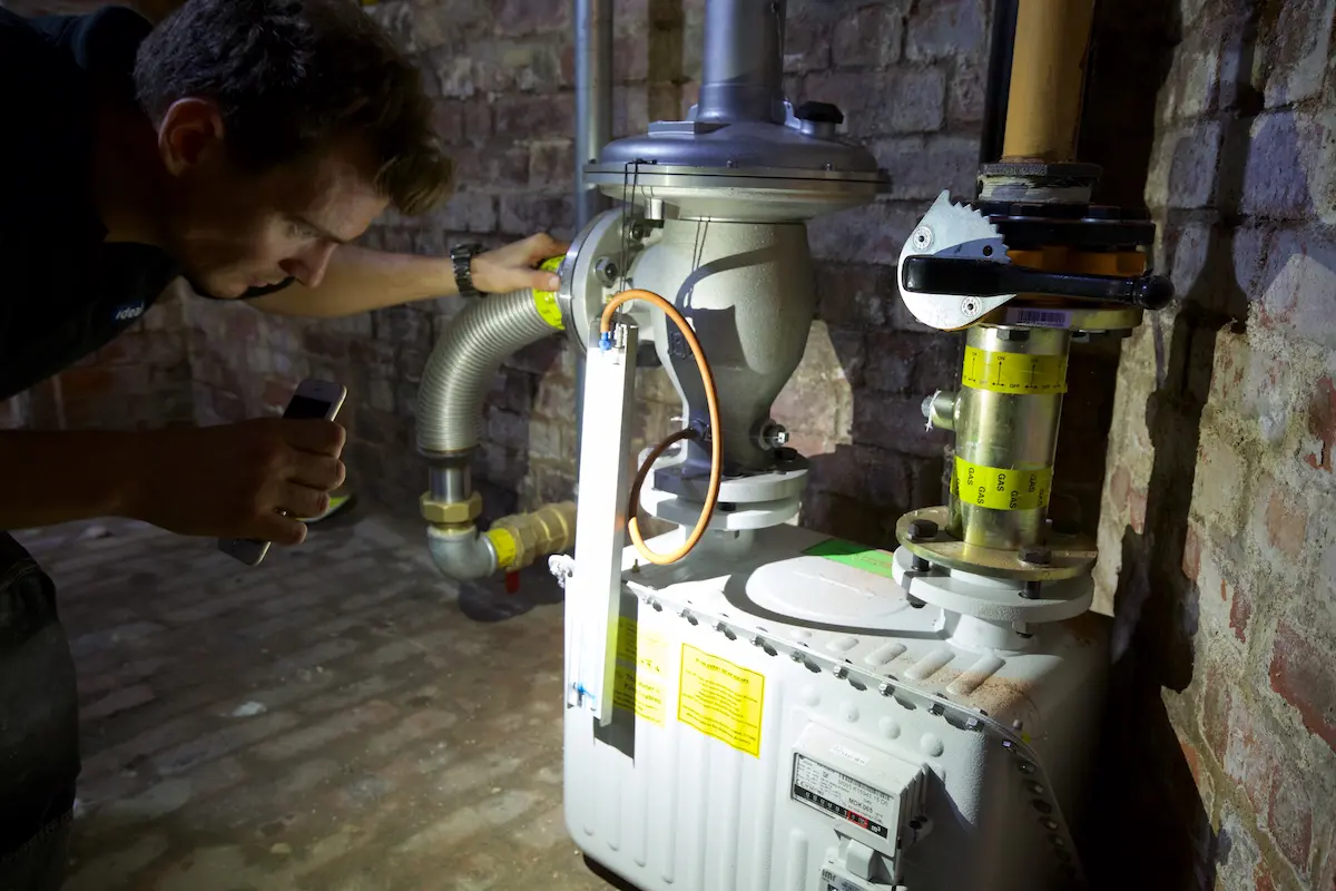 Vector Heat engineer working on commercial gas equipment